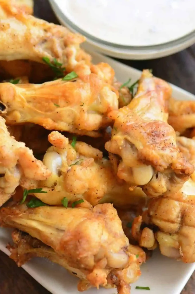 Baked-chicken-wings-stacked-on-the-plate