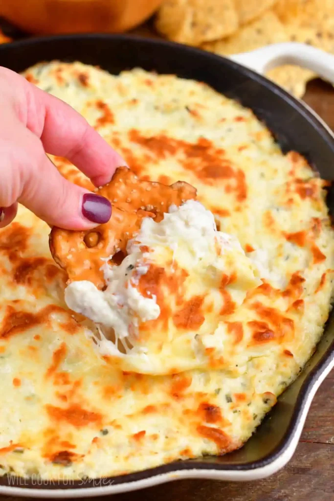 Chicken-Ranch-Dip-scooping-with-pretzel