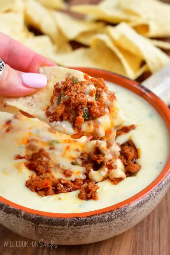 Queso-Blanco-with-Chorizo-scooped-on-tortilla-chip